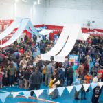 Multitudinaria jornada de intercambio de figuritas en el Club Los Rojos de Gerli organizada por el senador Santalla